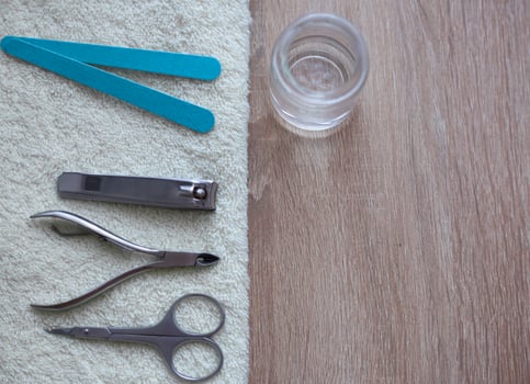 Nail care accessories. Professional steel pedicure tools. Beauty concept. photo