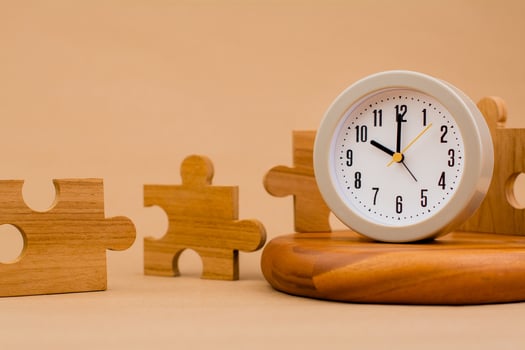 Clock and jigsaw puzzle pieces. Time lapse time. Wooden jigsaw puzzle pieces. communication teamwork key components photo