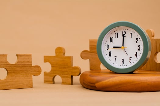 Clock and jigsaw puzzle pieces. Time lapse time. Wooden jigsaw puzzle pieces. communication teamwork key components photo