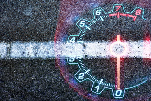 Speedometer car on black road textured photo