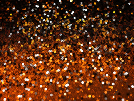 Abstract Halloween or Thanksgiving party invitation with glitter and sparkles on orange and black background. Generative AI photo