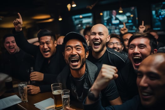 New Zealand football fans celebrating a victory photo