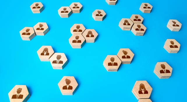 Business people on hexagonal figures. Searching for candidates, hiring new employees for vacancies. Human resources. Personnel management. Communication, organize of work relations of company workers. photo