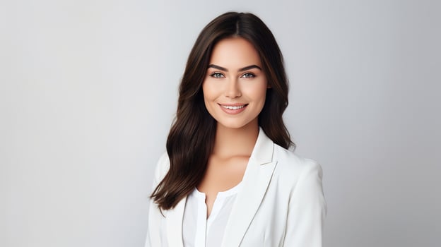 A beautiful young woman in a white blazer photo
