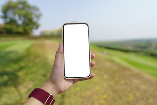 Close up of women's hands holding cell telephone blank copy space screen. smart phone with technology concept photo