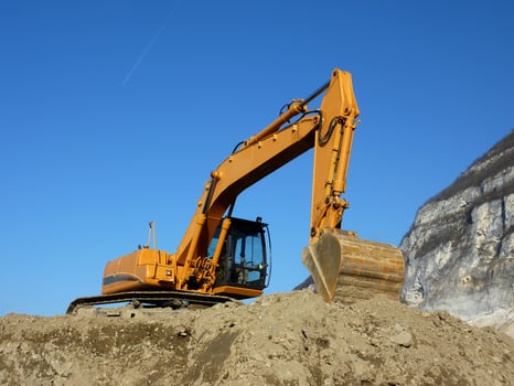 Orange mechanical digger photo