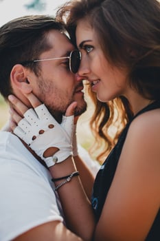 young couple in love, riding a motorcycle, hug, passion, free spirit photo