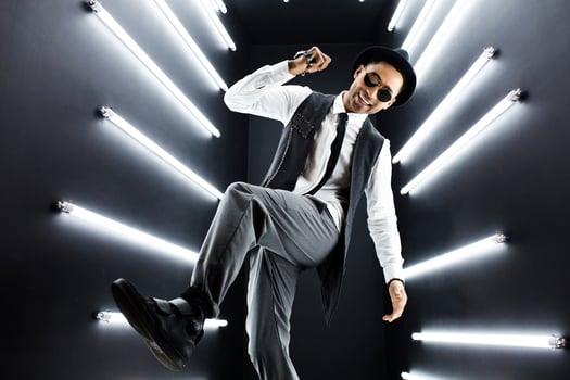 black man dancing in neon lights photo
