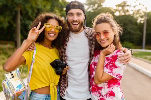 happy young company of friends having fun in park photo
