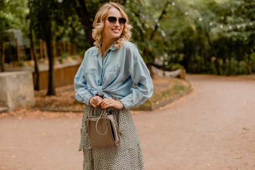 attractive woman walking in street photo