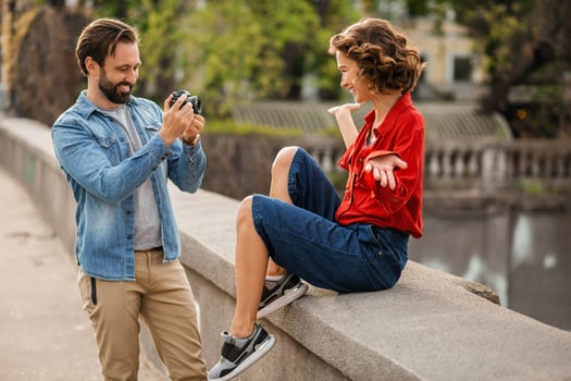 man and woman on romantic vacation walking together photo