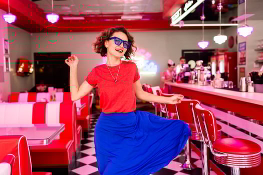 stylish smiling woman in retro vintage cafe photo