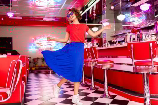 stylish smiling woman in retro vintage cafe photo