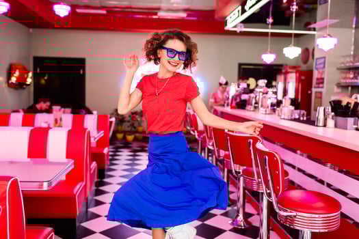 stylish smiling woman in retro vintage cafe photo