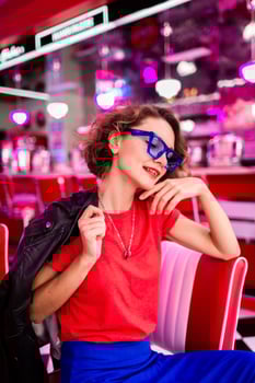 stylish smiling woman in retro vintage cafe photo
