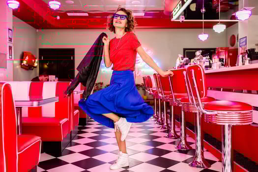 stylish smiling woman in retro vintage cafe photo
