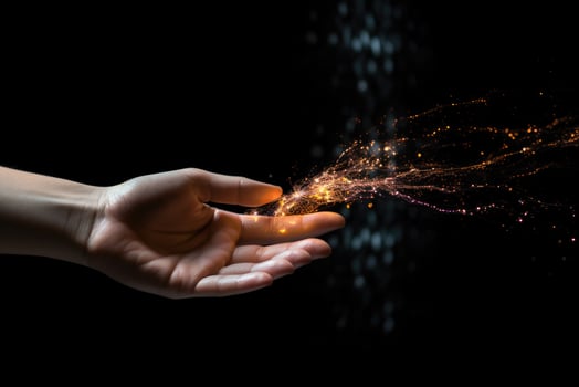 a hand holding a sparkler in the darkness, creating a mesmerizing light show photo