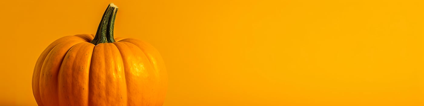 A pumpkin against a yellow background. Generative AI photo