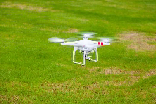 flying drone with camera prepair to fly photo