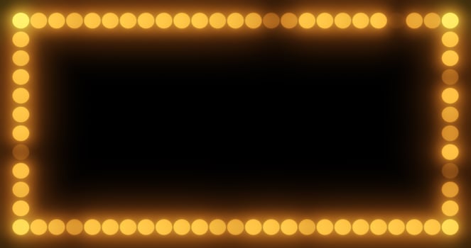 Abstract beauty frame of glowing yellow lights and light bulbs glowing bright magical energy on a black background photo