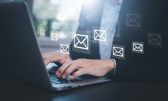 Businesswoman holding smartphone with communication icons, letter icon, email icons, and newsletter email and protect your personal information or spam mail, Customer service call center contact. photo