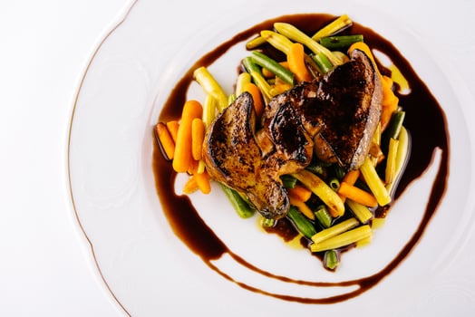 liver dish with green beans and carrots photo