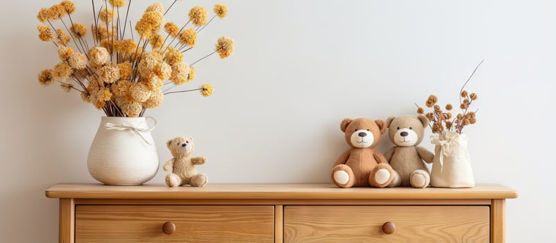 Children s room decor with wooden toys and dried flowers on chest of drawers photo