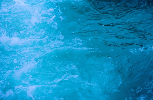 Blue water surface background photo