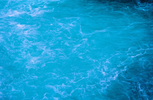 Blue water surface background photo