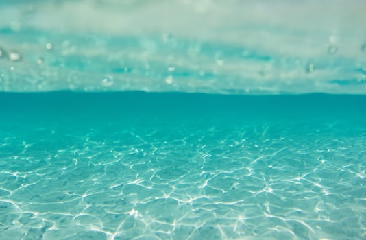 Blue water surface background photo