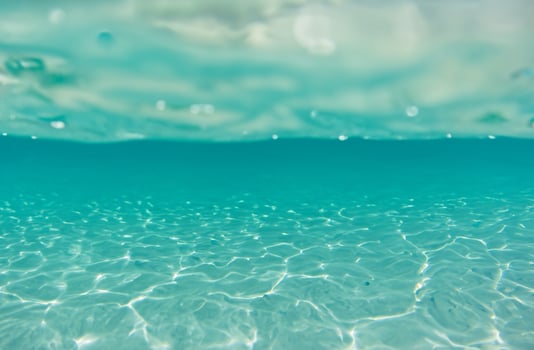 Blue water surface background photo