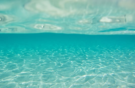 Blue water surface background photo