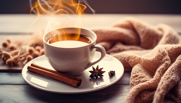 Cup of Steaming Tea Coffee, Knitted Blanket, and Cinnamon Anise. Generative AI photo