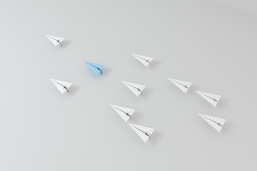 Blue paper plane white ones on white background, 3d rendering. photo