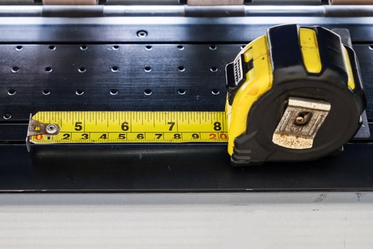 Measuring Tape yellow black on aluminum sheet photo