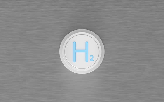 A white button with hydrogen engraved on it, 3d rendering. photo