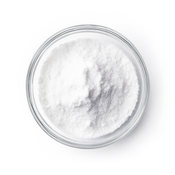 Baking soda isolated on white background top view photo
