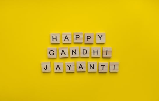 October 2, happy Gandhi Jayanti, a minimalistic banner with the inscription in wooden letters photo