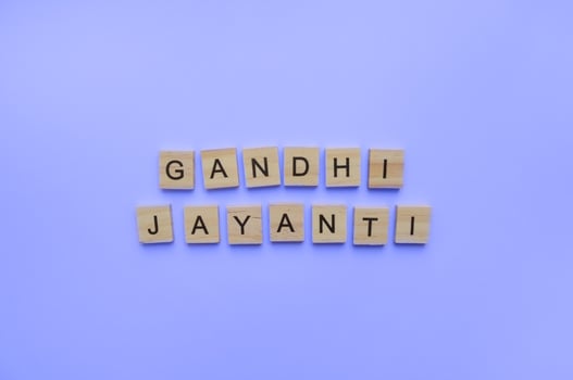October 2, Gandhi Jayanti, minimalistic banner with wooden letters photo