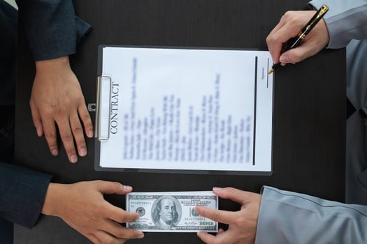 Businessmen pay kickbacks to government officials to facilitate real estate investments and large kickbacks also protect against project faults and shortcomings. concept kickbacks for convenience. photo
