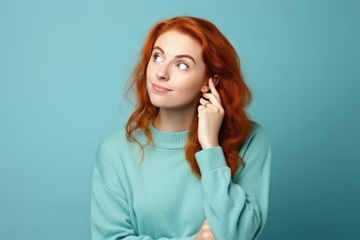 Woman with red hair thinking about something photo