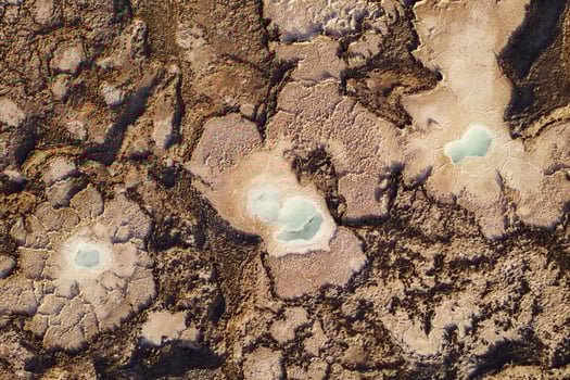Salt pond in the dry land in Qinghai, China. photo