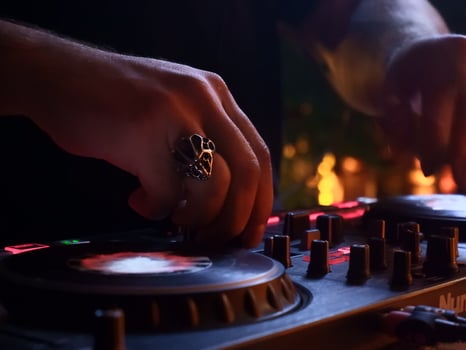 Dj playing  electronic music photo