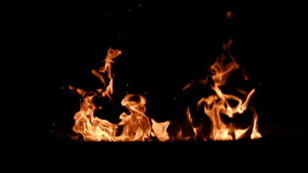 Flames in the darkness of the night photo