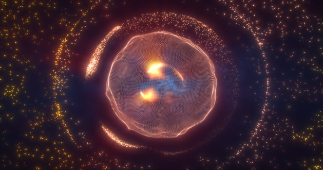 Abstract orange energy sphere from particles and waves of magical glowing on a dark background photo