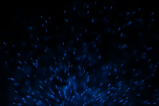 Flowing and glowing particles with dark background, 3d rendering photo
