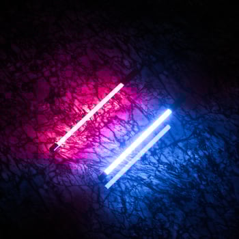 Glowing neon tubes and marble background, 3d rendering. photo