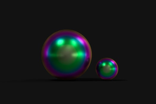 Spheres with the colorful surface, dark background, 3d rendering. photo