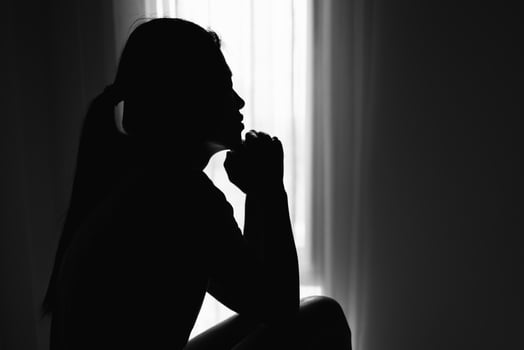 Silhouette of Religious young woman praying to God in the morning, spirtuality and religion,  Christians and Bible study concept. photo