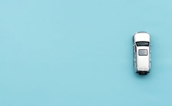 Car model isolated on blue background, after some edits. photo